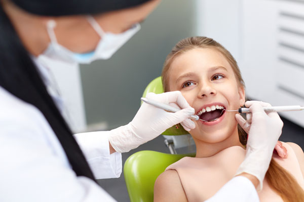 child having dental checkup